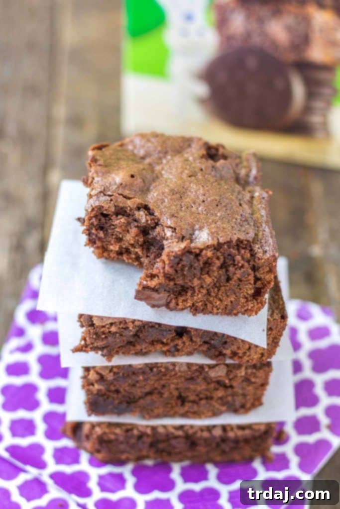 These Pillsbury Pillsbury Girl Scouts Baking Mixes feature the flavor of Samoas in their Caramel and Coconut Blondies and Thin Mint Cookies in their Thin Mint Brownies. All I can say is, Pillsbury nailed it. Now you can enjoy the flavor of Girl Scout cookies all year long! | Strawberry Blondie Kitchen