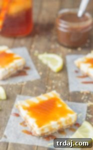 Arnold Palmer Cheesecake Bars with a prominent sweet tea caramel drizzle.