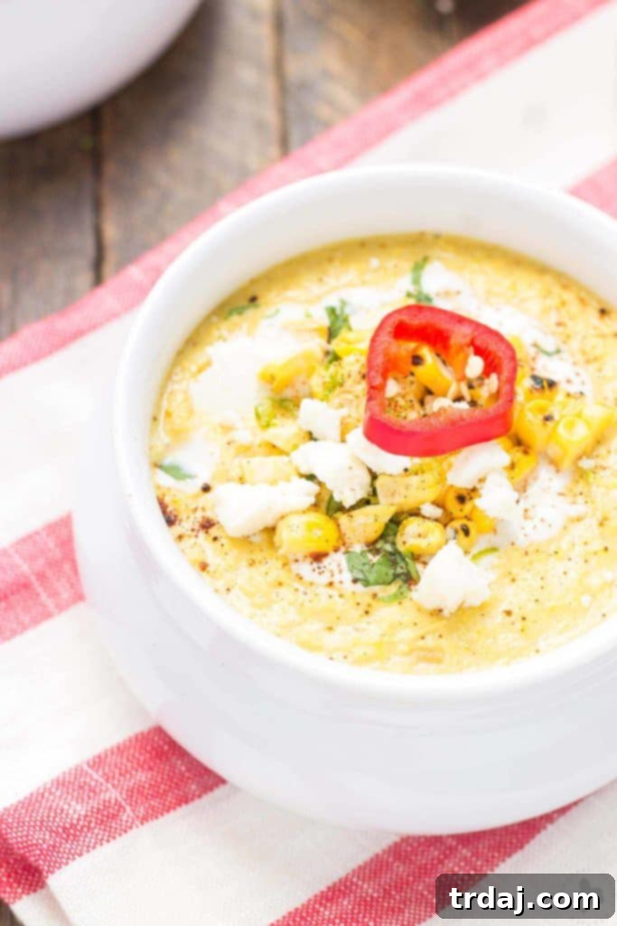 Close-up of fresh corn kernels and chopped ingredients, ready to be cooked for Mexican Street Corn Chowder, showing vibrant colors and textures.