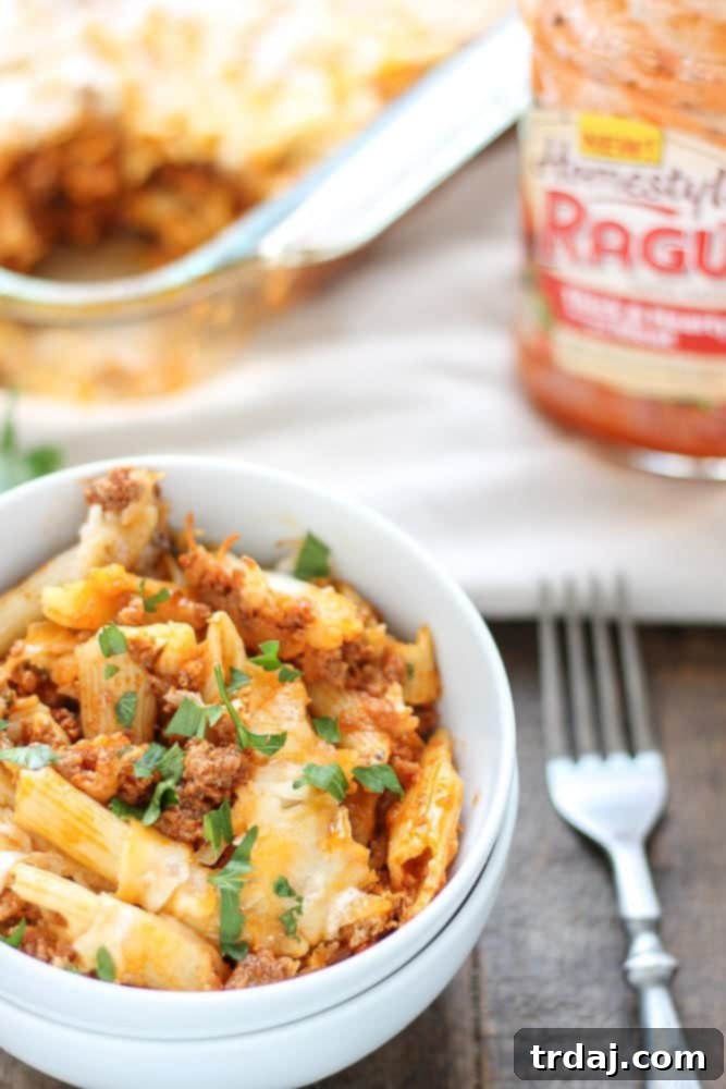 Hearty Baked Mostaccioli with melted cheese and rich RAGÚ Homestyle Thick & Hearty Meat Sauce, a perfect family comfort food.