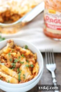 Baked Mostaccioli dish, cheesy and meaty, presented as a classic comfort food recipe.
