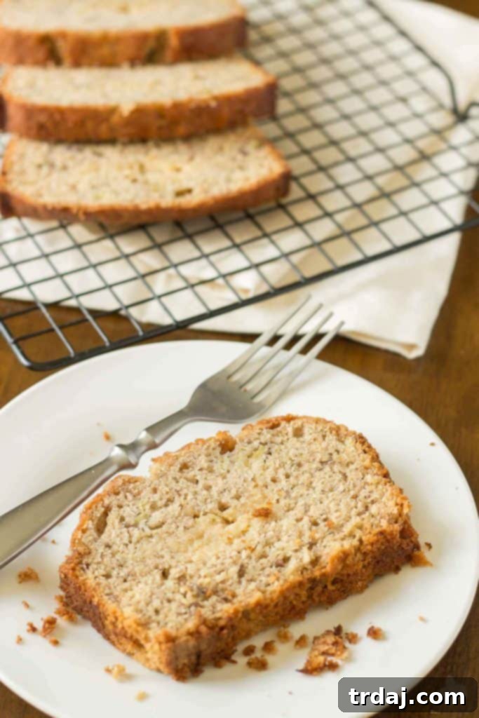 Super moist banana bread is ribboned with brown sugar cream cheese and aromatic spices making this Brown Sugar Stuffed Banana Bread one outstanding quick bread. It's sure to be the last banana bread recipe you'll ever need! | Strawberry Blondie Kitchen