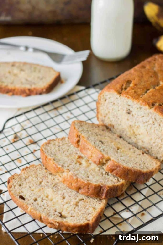 Super moist banana bread is ribboned with brown sugar cream cheese and aromatic spices making this Brown Sugar Stuffed Banana Bread one outstanding quick bread. It's sure to be the last banana bread recipe you'll ever need! | Strawberry Blondie Kitchen