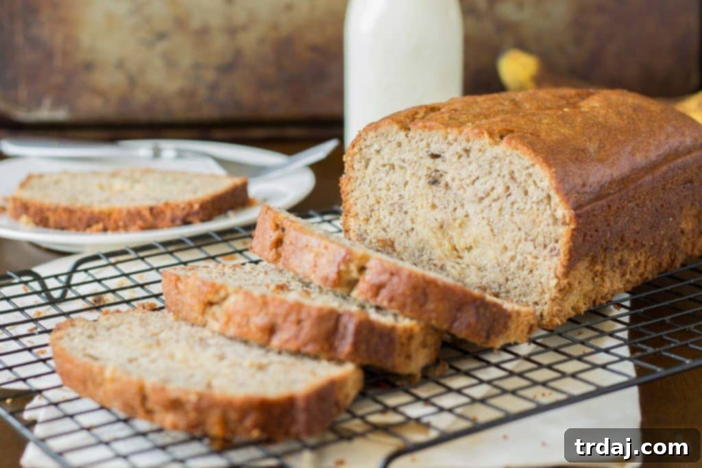 Super moist banana bread is ribboned with brown sugar cream cheese and aromatic spices making this Brown Sugar Stuffed Banana Bread one outstanding quick bread. It's sure to be the last banana bread recipe you'll ever need! | Strawberry Blondie Kitchen