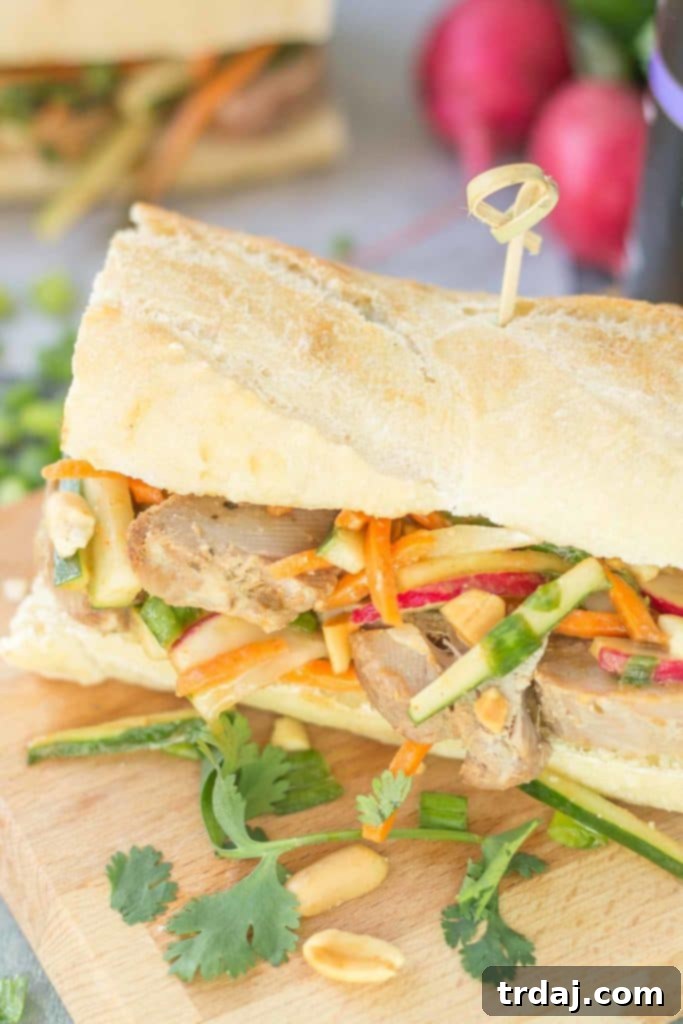 Pork Banh Mi with fresh ingredients and House of Tsang sauces