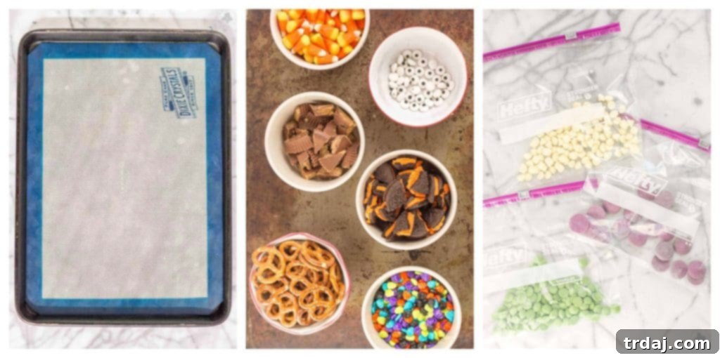 Monster Mash Bark 5 Overhead shot of a tray of Halloween Candy Bark, featuring vibrant colors and various candy pieces.