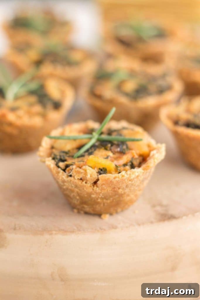 Goat Cheese, Kale, and Potato Rosemary Cracker Bites 6 Rosemary Cracker Bites with Goat Cheese, Kale and Potatoes, freshly baked and ready to serve. | Strawberry Blondie Kitchen