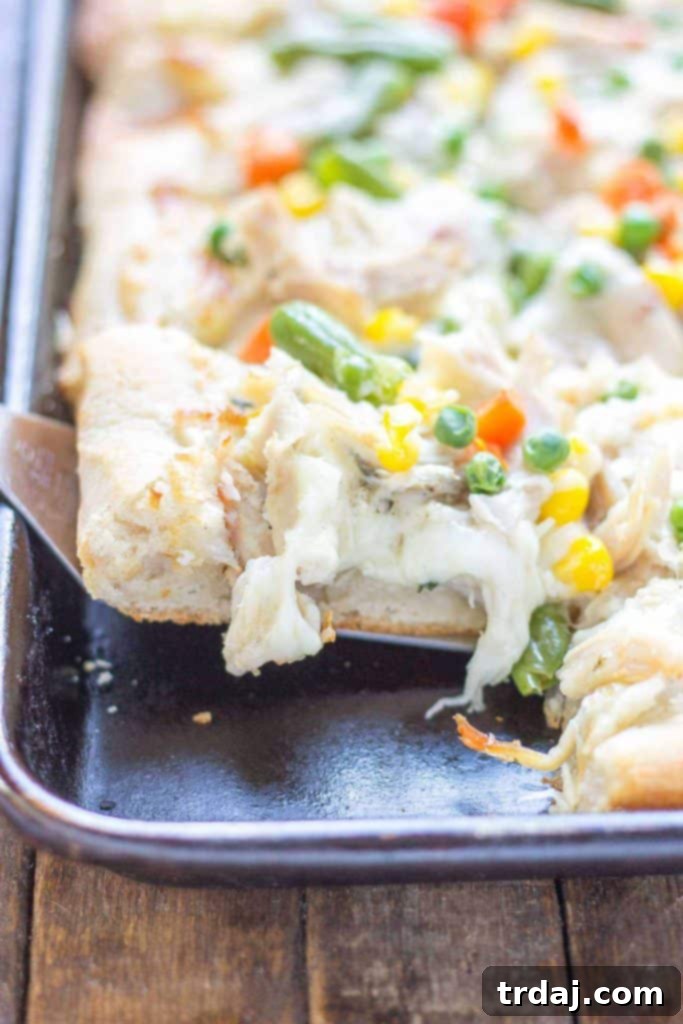 Turkey Pot Pie Pizza Bake 6 A perfectly roasted Honeysuckle White Whole Turkey, golden brown and juicy, ready to be carved and enjoyed as the centerpiece of a Thanksgiving meal. | Strawberry Blondie Kitchen