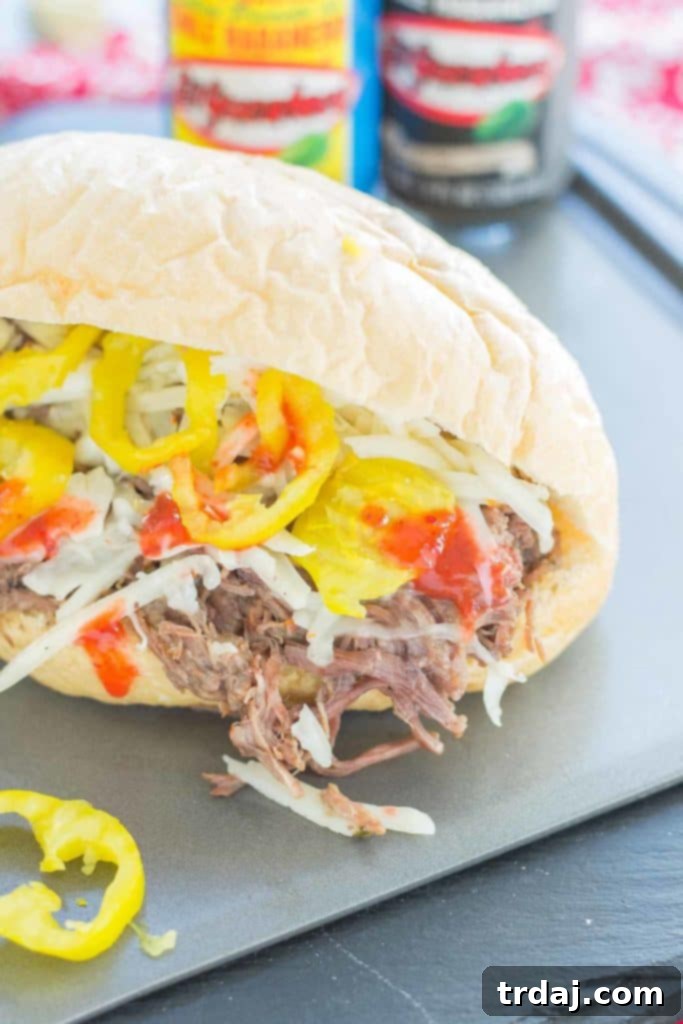 Slow-Cooked Short Rib Sandwiches 3 Juicy, tender slow cooked beef short ribs paired with El Yucateco hot sauce and melty cheese on bolillo rolls make the ultimate Short Rib Sandwiches. | Strawberry Blondie Kitchen