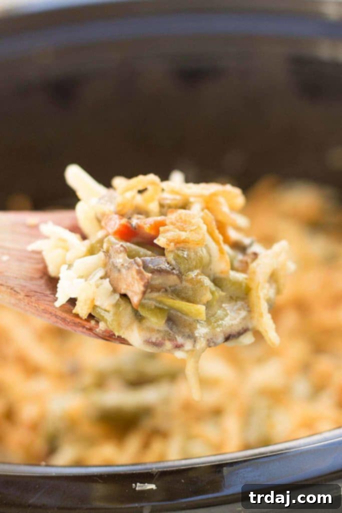 Creamy White Cheddar Green Bean Casserole (Slow Cooker) 7 Sharp white cheddar cheese elevates this Slow Cooker White Cheddar Green Bean Casserole to make it the star side dish of your holiday table! | Strawberry Blondie Kitchen