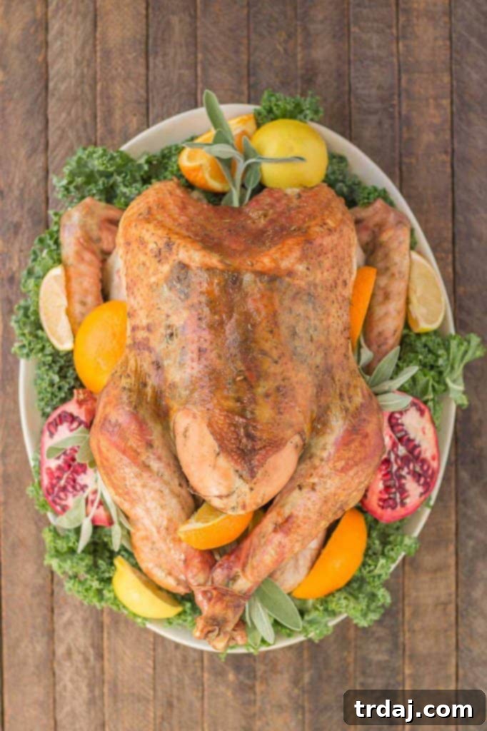 Juicy, moist and super flavorful, this Herb Roasted Turkey should be at the center of your Thanksgiving table! | Strawberry Blondie Kitchen
