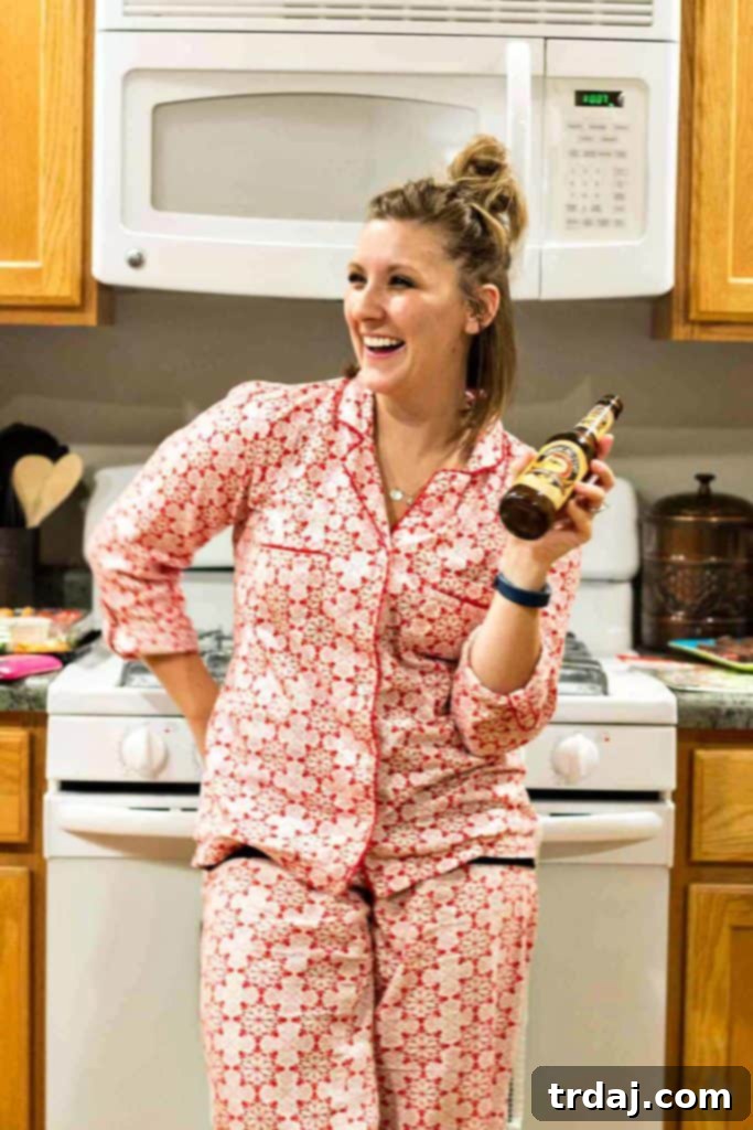 Enhance your Holiday Pajama and Cookie Party with a delicious cranberry and rosemary white sangria, perfect for festive gatherings.