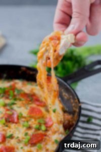 Detailed image of Supreme Pizza Dip with all its delicious ingredients.