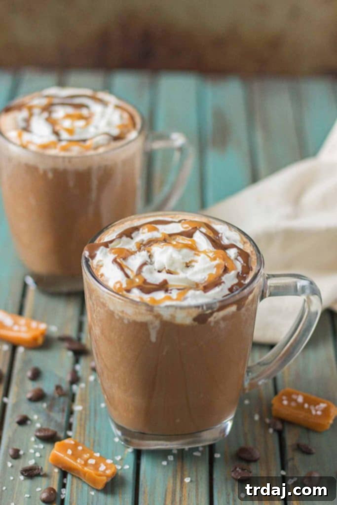 Decadent Sea Salt Caramel Mocha 3 Creamy espresso blends perfectly with chocolate and almond milk, topped with whipped cream, caramel drizzle and a sprinkle of sea salt, making this Sea Salt Caramel Mocha irresistibly delicious! | Strawberry Blondie Kitchen