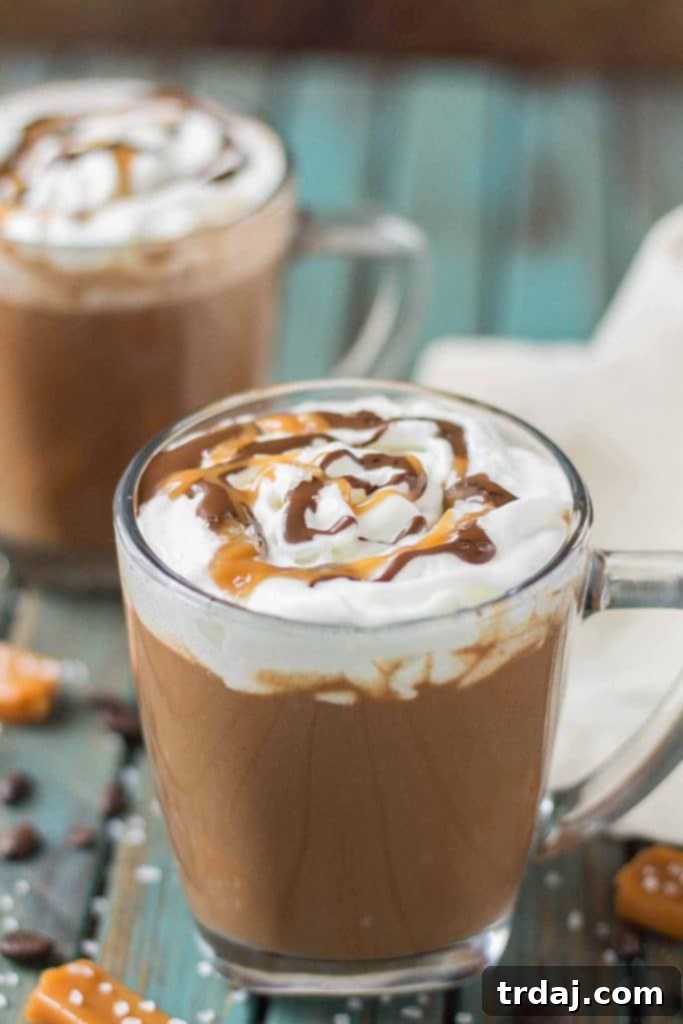 Decadent Sea Salt Caramel Mocha 4 Creamy espresso blends perfectly with chocolate and almond milk, topped with whipped cream, caramel drizzle and a sprinkle of sea salt, making this Sea Salt Caramel Mocha irresistibly delicious! | Strawberry Blondie Kitchen