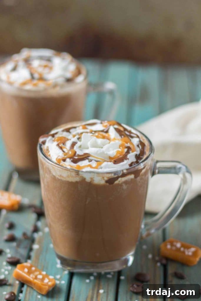 Decadent Sea Salt Caramel Mocha 5 Creamy espresso blends perfectly with chocolate and almond milk, topped with whipped cream, caramel drizzle and a sprinkle of sea salt, making this Sea Salt Caramel Mocha irresistibly delicious! | Strawberry Blondie Kitchen
