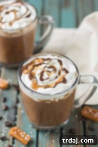 Decadent Sea Salt Caramel Mocha 7 Creamy espresso blends perfectly with chocolate and almond milk, topped with whipped cream, caramel drizzle and a sprinkle of sea salt, making this Sea Salt Caramel Mocha irresistibly delicious! | Strawberry Blondie Kitchen