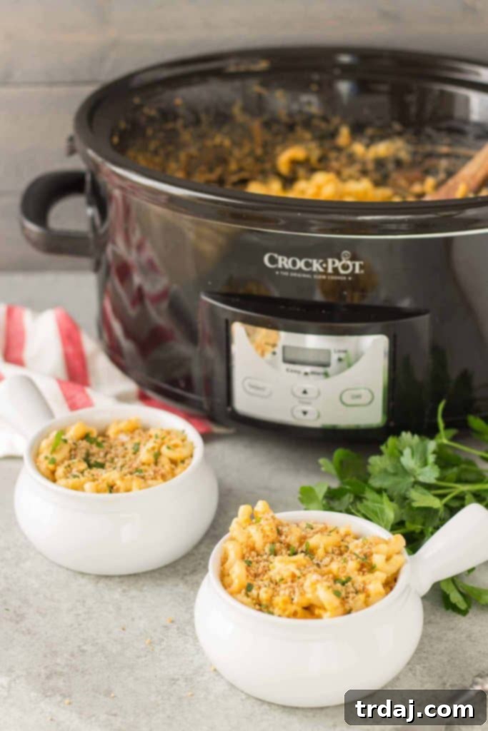 The ultimate cheesy, creamy, and easy slow cooker macaroni and cheese recipe perfect for family dinners.