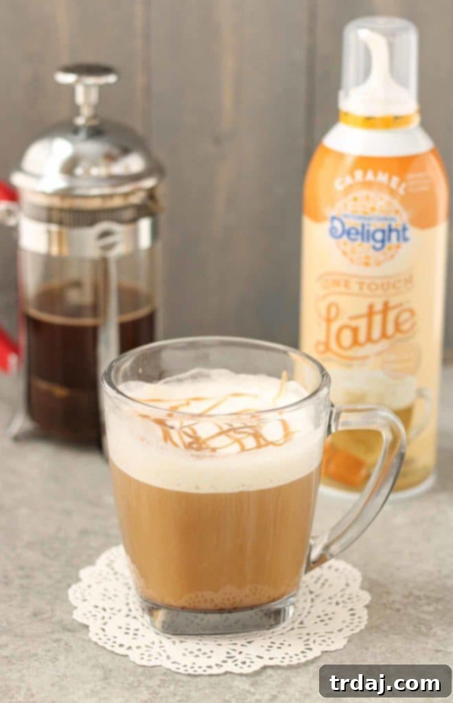 Experience the joy of a delicious, sweetened, flavored, and frothed latte in just 3 easy steps with International Delight® One Touch Latte™. Quick, easy, and incredibly tasty! | Strawberry Blondie Kitchen