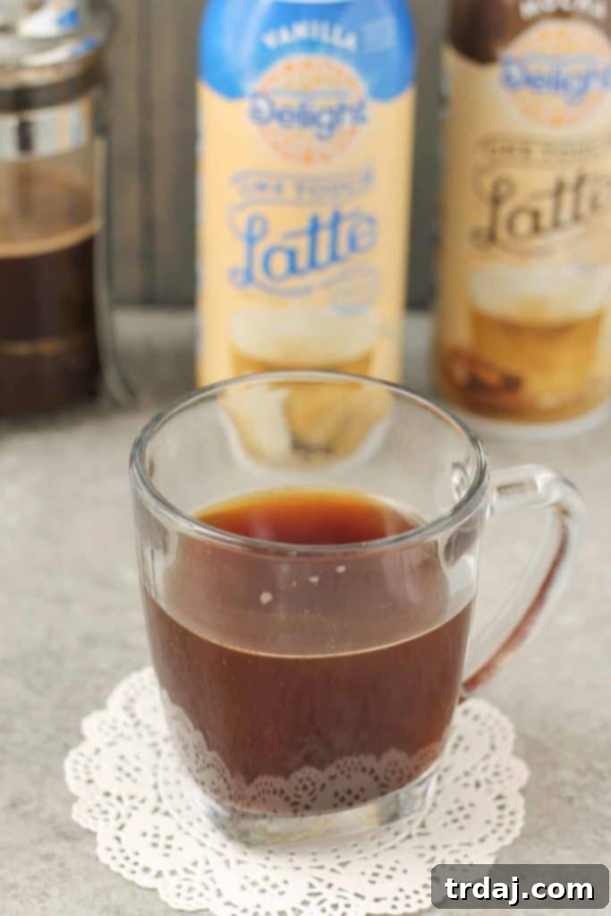 Enjoy a delicious, sweetened, flavored, and frothed latte effortlessly with International Delight® One Touch Latte™. Three simple steps, incredible taste! | Strawberry Blondie Kitchen