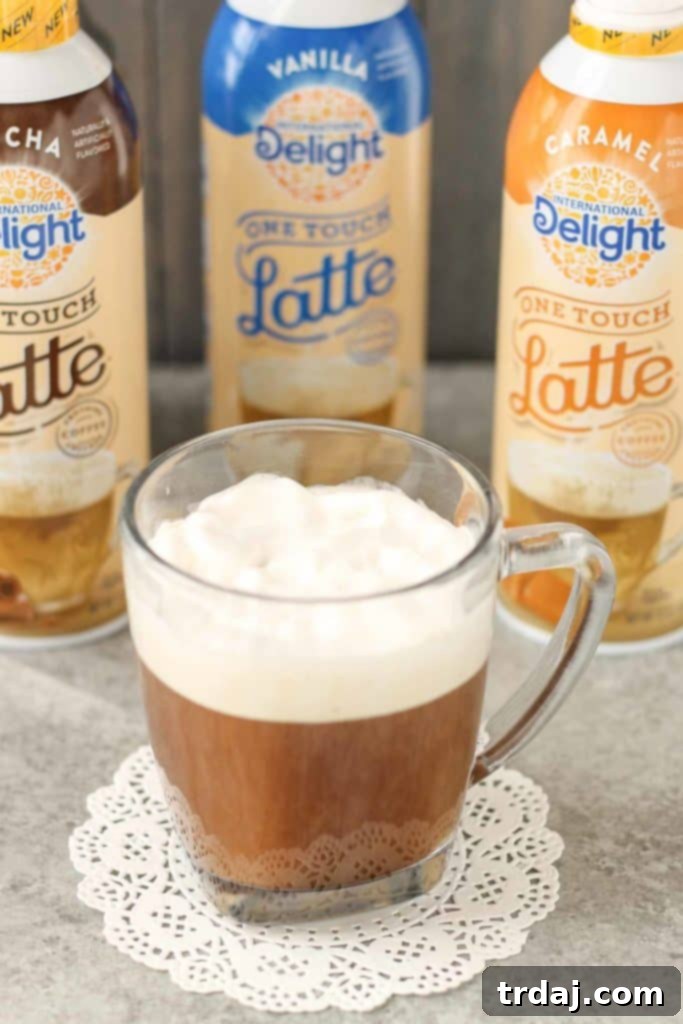 Transform your coffee into a delicious, sweetened, flavored, and frothed latte with just 3 steps using International Delight® One Touch Latte™. So easy, so good! | Strawberry Blondie Kitchen