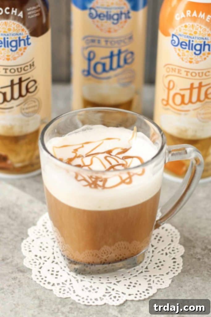Create a delicious, sweetened, flavored, and frothed latte effortlessly at home with International Delight® One Touch Latte™. Your 3-step solution to coffee perfection! | Strawberry Blondie Kitchen
