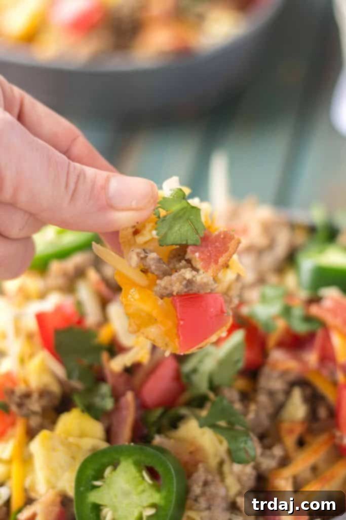 A beautifully presented platter of The B.E.S.T Breakfast Nachos, ready to be enjoyed.