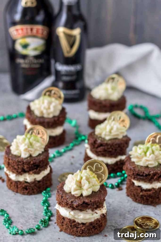 A festive close-up of Chocolate Guinness Mini Cakes, highlighting the rich texture and delicious Baileys Buttercream.