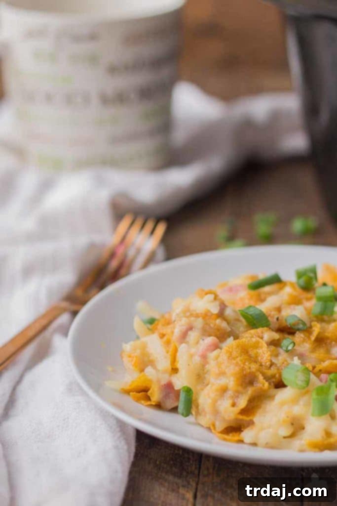 Crock-Pot Hash Brown Casserole 2 Delicious Slow Cooker Hash Brown Casserole, a perfect cheesy potato dish for breakfast, brunch, or a side.