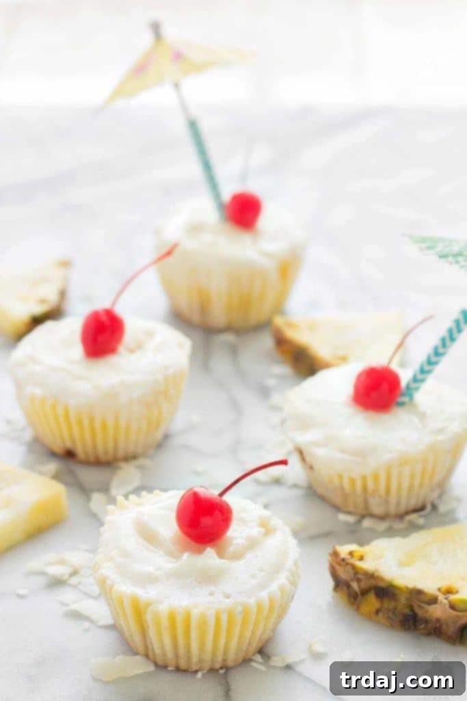 Refreshing Piña Colada Ice Cream Bites with coconut crust and pineapple layer