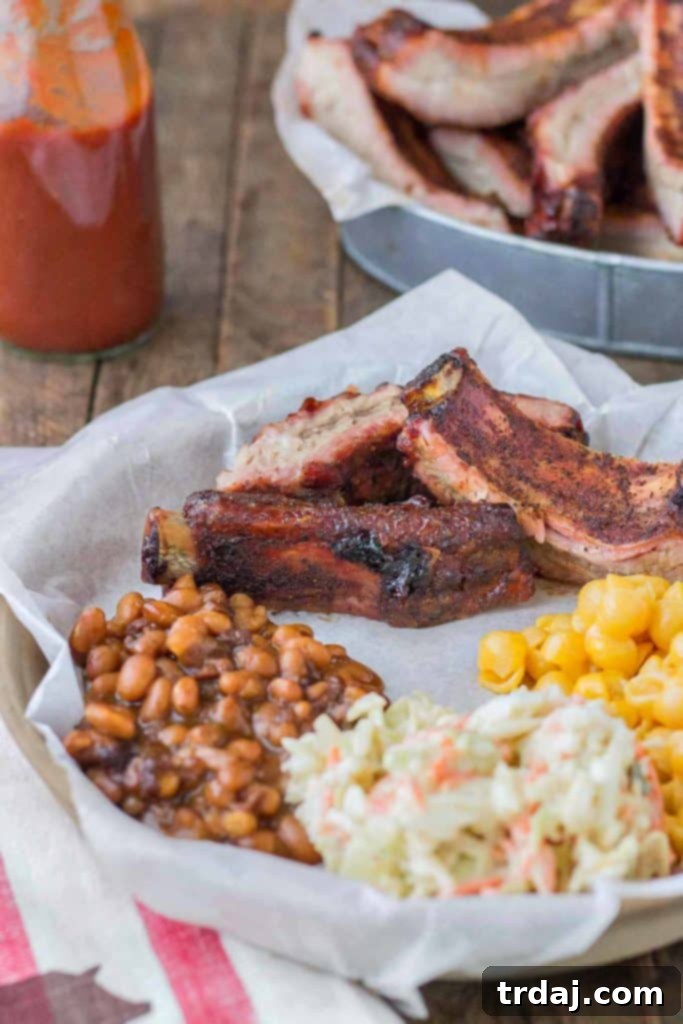 Sweet and Smoky Dry Rubbed Pork Ribs, incredibly tender and juicy, prepared with Smithfield Extra Tender Pork Back Ribs. A must-try BBQ recipe for your grill. | Strawberry Blondie Kitchen