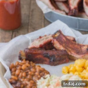 Sweet and Smoky, these Dry Rubbed Pork Ribs are extra tender and juicy thanks to Smithfield Extra Tender Pork Back Ribs. One lookand you'll be running to the grill to make your own! | Strawberry Blondie Kitchen