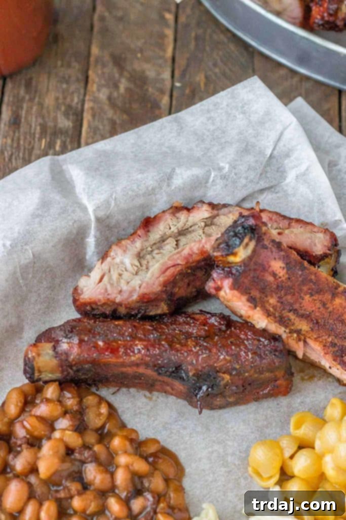 Final plated Dry Rubbed Pork Ribs, highlighting their tenderness and succulent appearance, achieved with Smithfield Extra Tender Pork Back Ribs. | Strawberry Blondie Kitchen