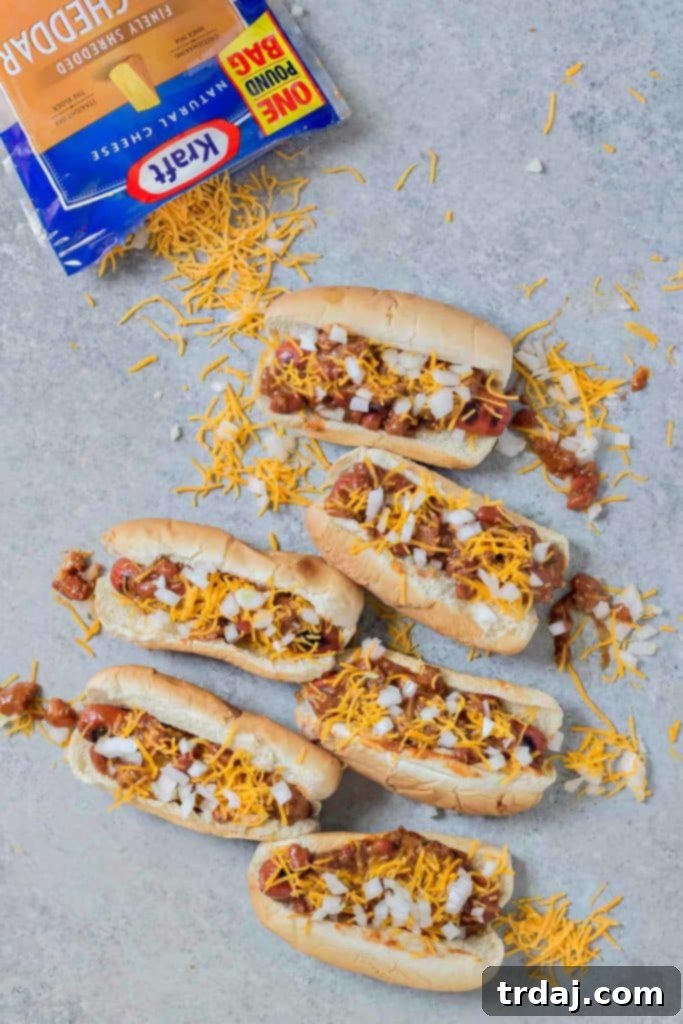 Effortless Chili Dogs 2 A perfectly prepared Easy Chili Dog, smothered in savory chili and topped with melted cheese, evoking childhood nostalgia.