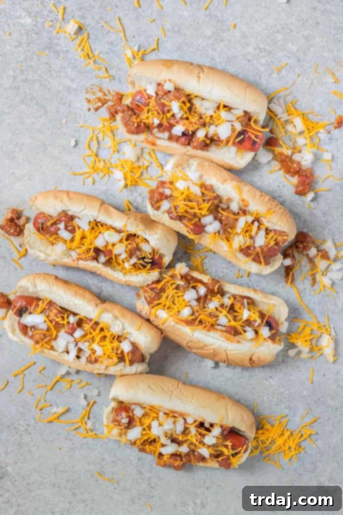 Effortless Chili Dogs 8 Kraft Shredded Cheddar Cheese, a key ingredient for the Easy Chili Dog recipe, shown in its packaging.