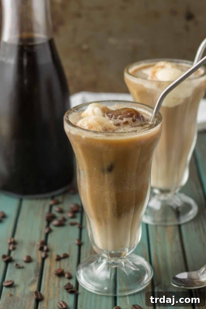 Have your coffee and your dessert too with this Coffee Cooler Float. Cold brew is combined with root beer, cream and vanilla ice cream to give you the ultimate in coffee indulgence! | Strawberry Blondie Kitchen