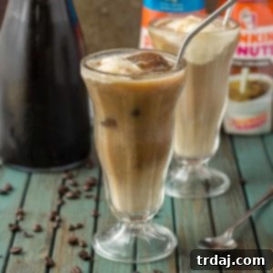 Have your coffee and your dessert too with this Coffee Cooler Float. Cold brew is combined with root beer, cream and vanilla ice cream to give you the ultimate in coffee indulgence! | Strawberry Blondie Kitchen