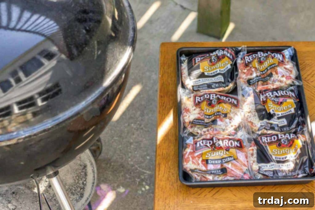 Children enjoying root beer floats and slices of grilled Red Baron pizza during a summer gathering.