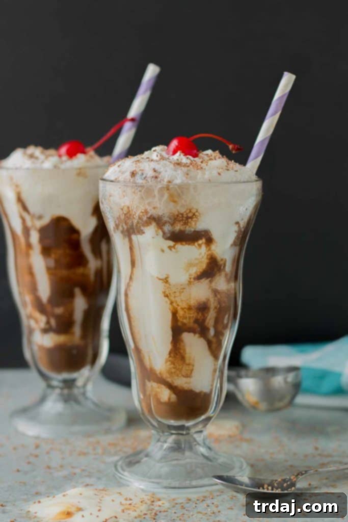 Chocolatey, fizzy, and with swirls of caramel delight ice cream, this Chocolatey Caramel Delight Fizzy Soda will help you beat the heat! | Strawberry Blondie Kitchen