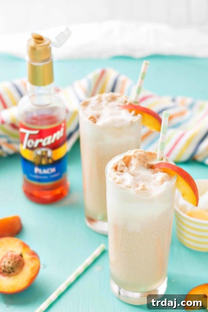 Torani Peach syrup bottle with easy-pour valve, highlighting its user-friendly design for making delicious drinks.