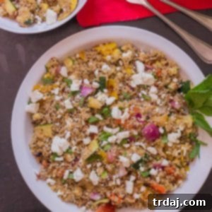 Smoky Grilled Veggie Quinoa Bowl 6 Grilled Vegetable Quinoa Salad, a vibrant and healthy dish, ready to be served.
