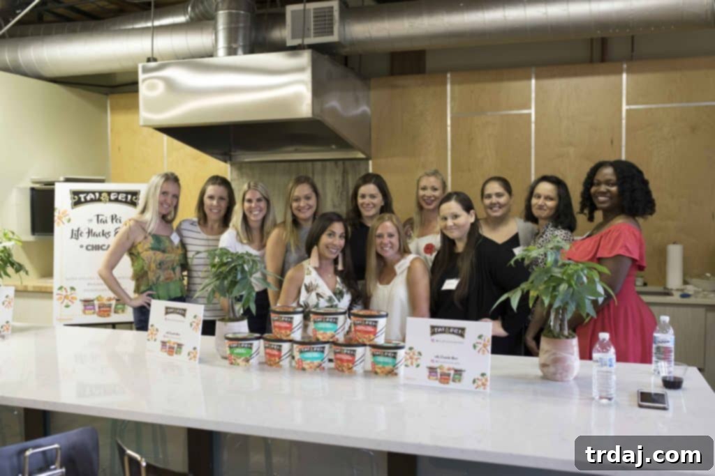 Attendees at the Tai Pei Foods Life Hacks event with Danielle Moss, focusing on time-saving strategies and convenient meal solutions. Learn how to simplify your daily routine.