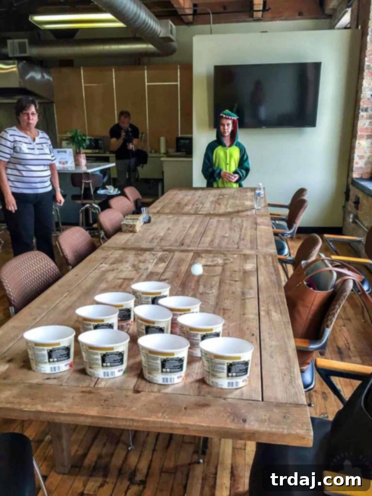 Engaging in Tai Pei Pong, a fun and creative way to reuse Tai Pei Foods containers, highlighting both delicious meals and sustainable practices for busy individuals.