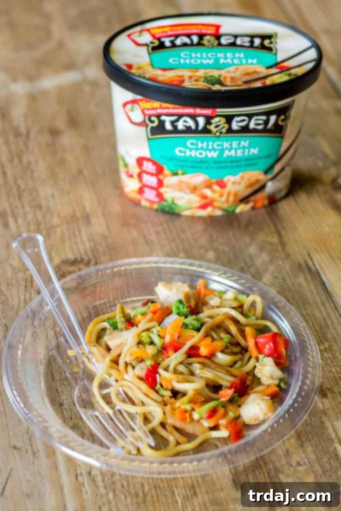 Tasting Tai Pei Foods' delicious single-serve entrees: Beef and Broccoli, Chicken Chow Mein, and General Tso's Spicy Chicken, showcasing rich flavors and quality ingredients.