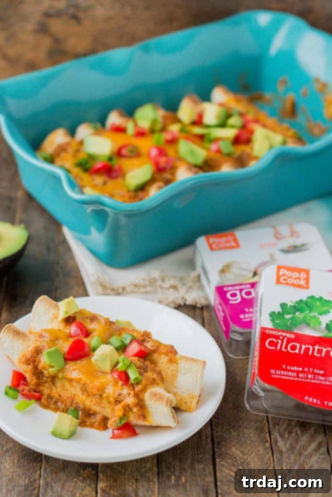 Delicious Chipotle Chicken Enchiladas made easy with rotisserie chicken and Pop & Cook, perfect for a family dinner.