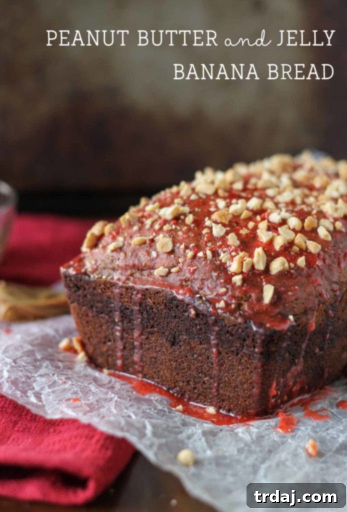 A stack of golden brown Peanut Butter and Jelly Banana Bread slices, perfectly baked and ready to eat.