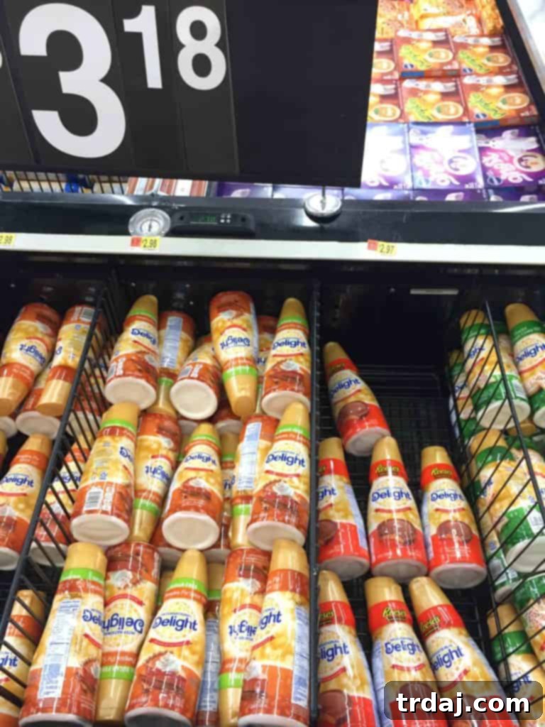 A vibrant display of International Delight REESE'S Peanut Butter Cup creamer bottles, ready to transform ordinary coffee into a delightful experience. | Strawberry Blondie Kitchen