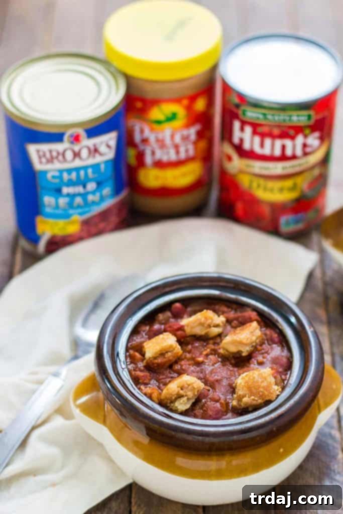 Appetizing shot of Crockpot Chili with peanut butter sandwich croutons, ready to be enjoyed