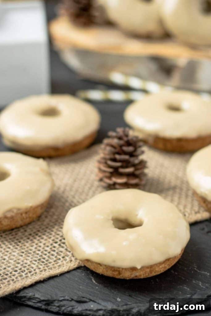 Moist and delicious Apple Cider Donuts with Maple Frosting, perfect for a crisp fall morning with coffee. | Strawberry Blondie Kitchen