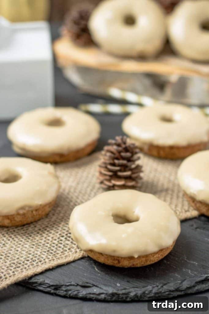 The perfect fall treat: Apple Cider Donuts with Maple Frosting, ready for your morning coffee. | Strawberry Blondie Kitchen